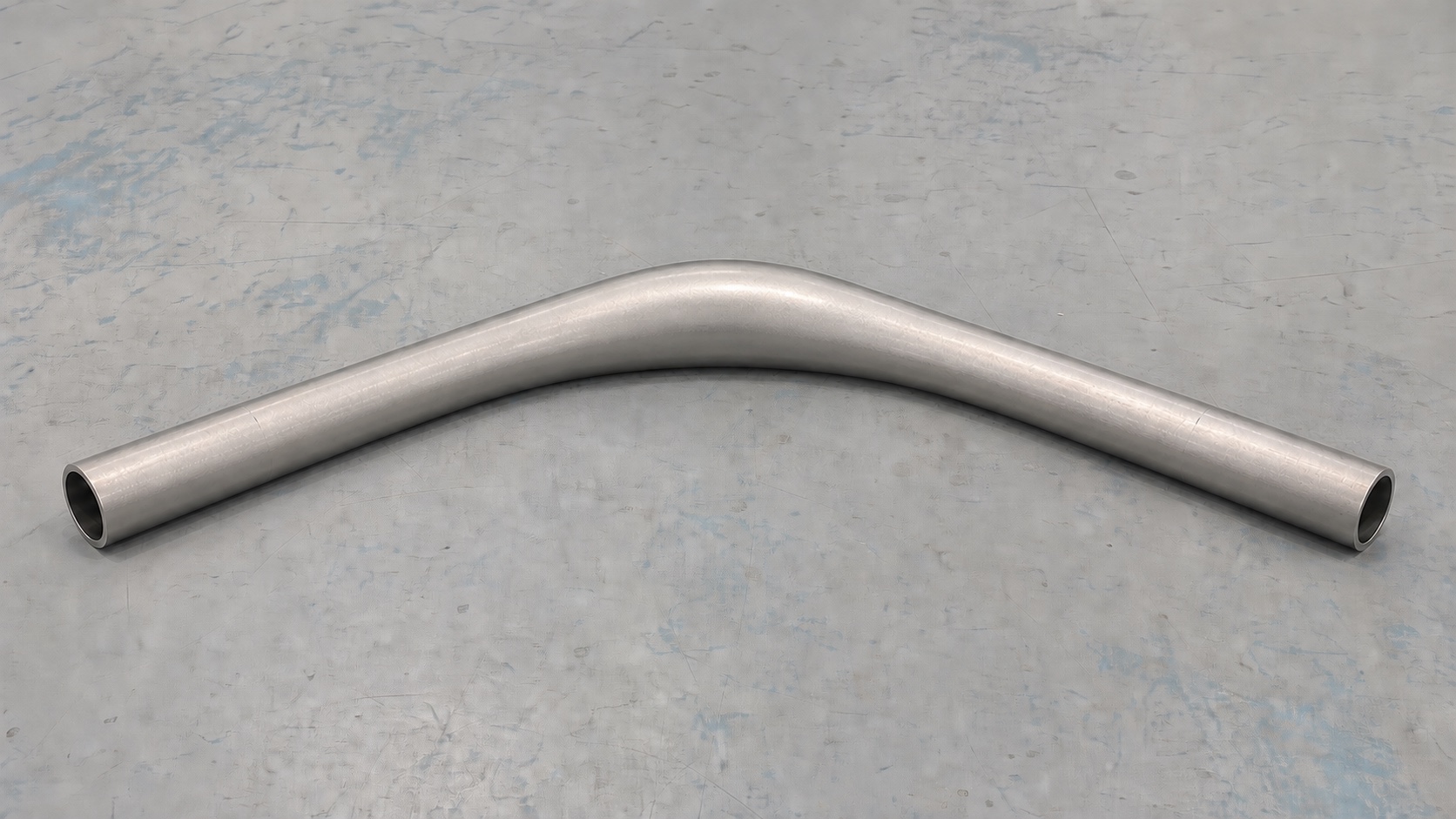 Photorealistic engineering concept of a hydroformed tube with unformed end regions, a shallow formed body and conceptual future trim positions